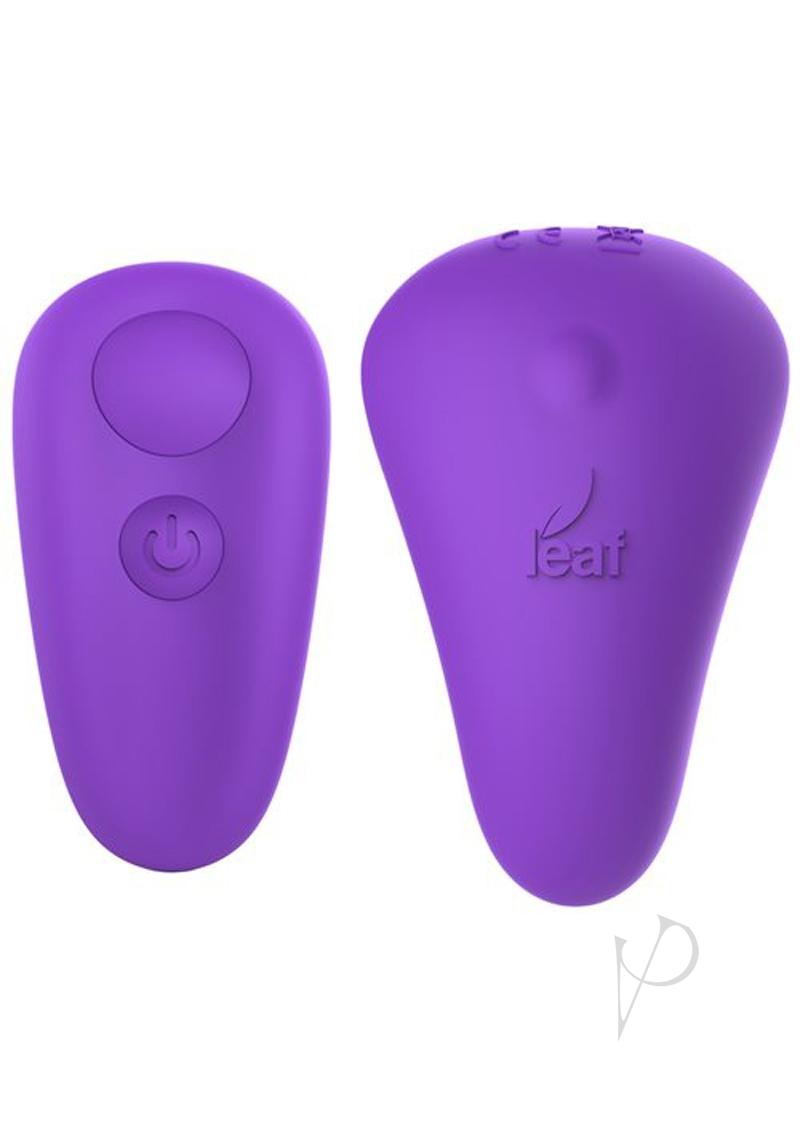 Leaf+ Spirit vibrator with remote control on a neutral surface